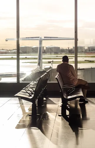 Person waiting at an airport lounge